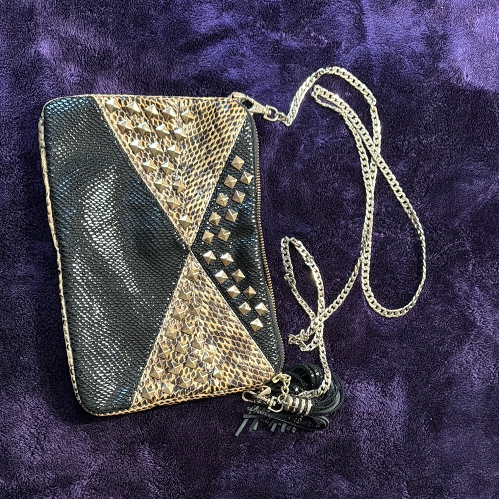 Elegant Black and Gold Clutch with Tassel Detail